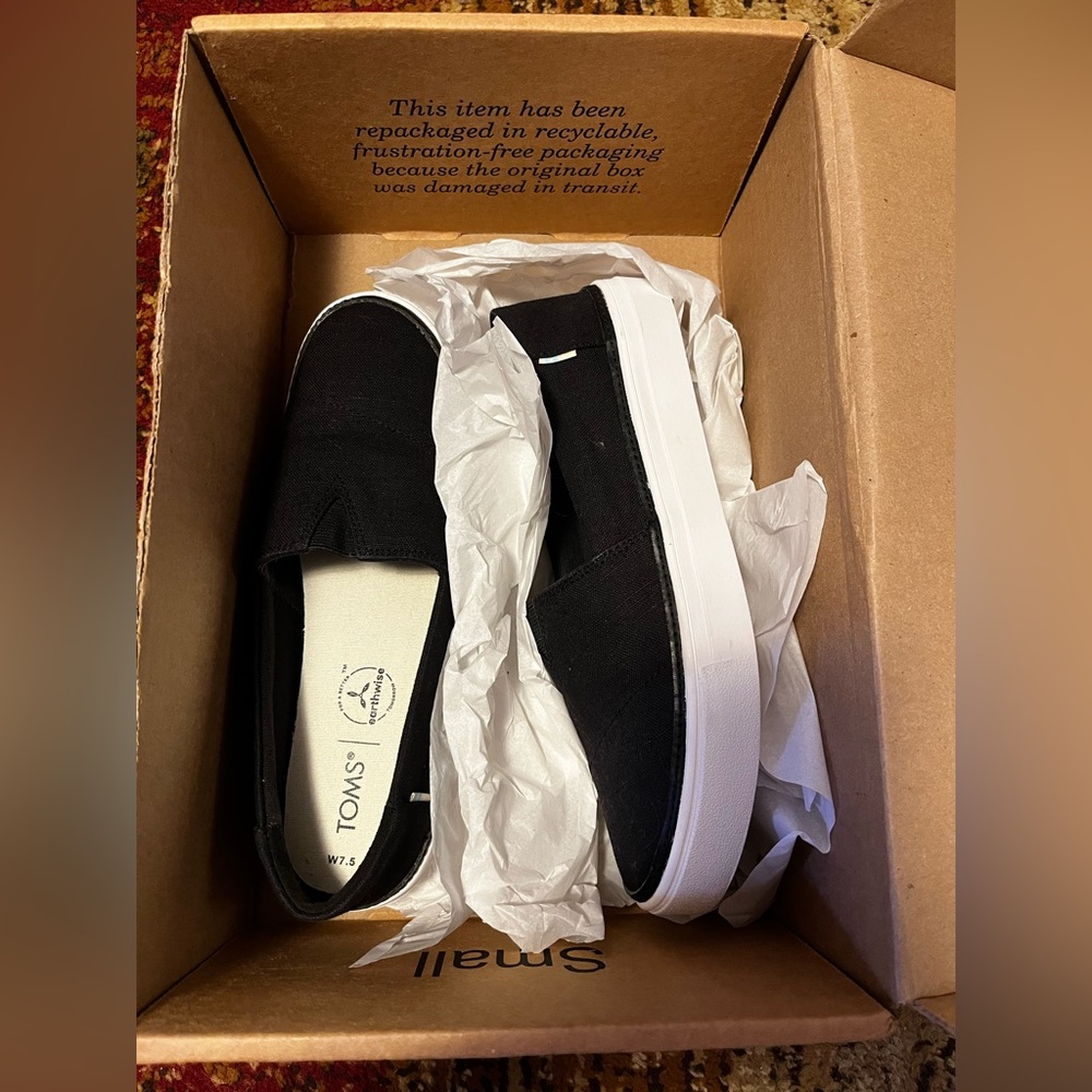 Toms black slip-on shoes! Never worn.